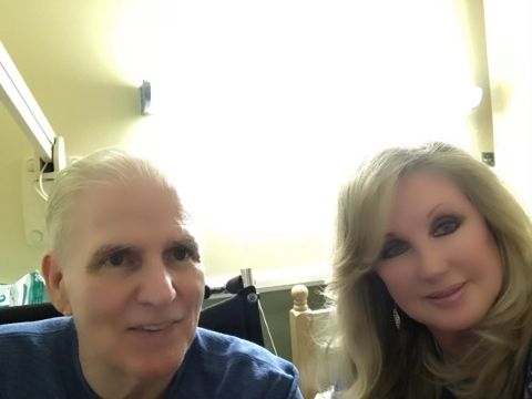 Morgan Fairchild poses a picture with her partner.